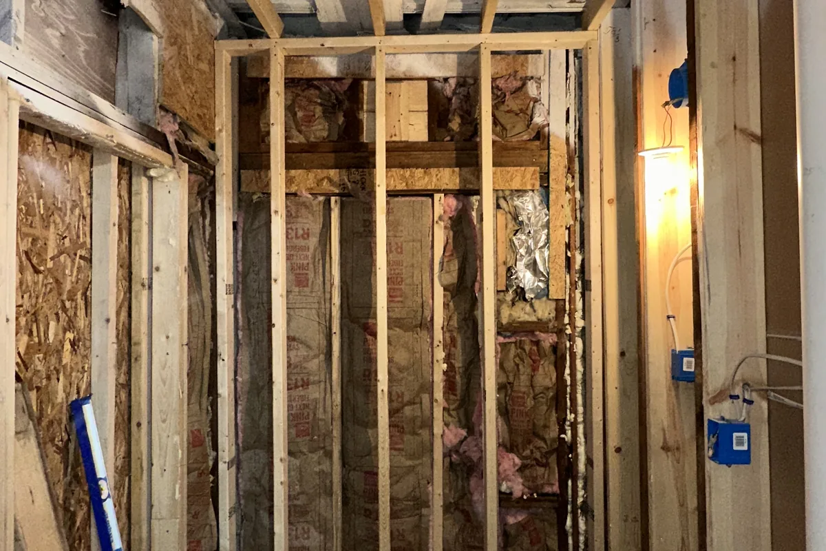 Framing and drywall — exposed studs and partition work, Metro Detroit